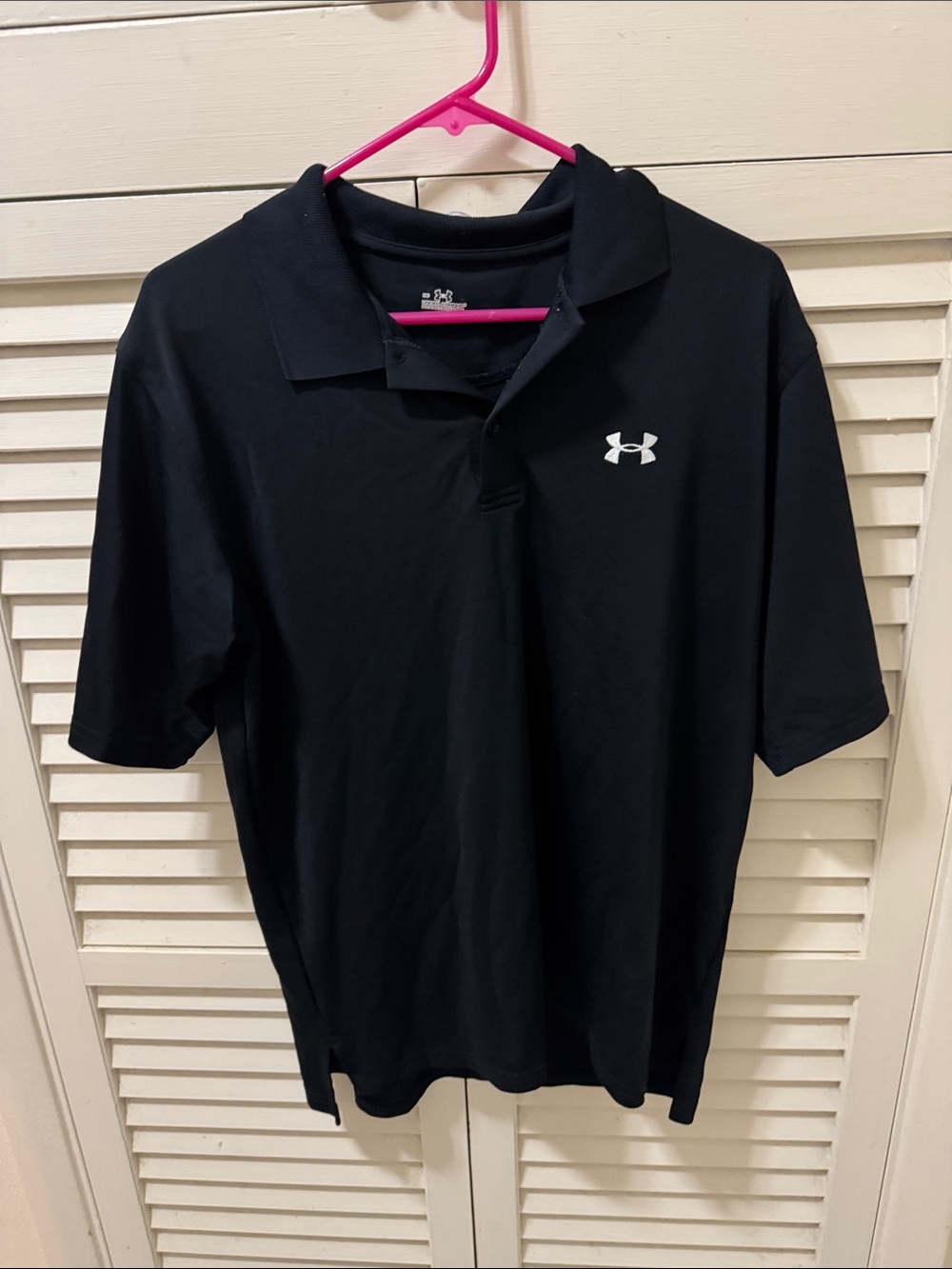 Under Armour Men’s navy blue Polo with White Logo